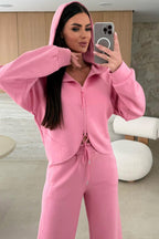 Pink solid color zip-up hoodie and drawstring loose pants set by Dear-Lover, made of polyester, viscose, and elastane.
