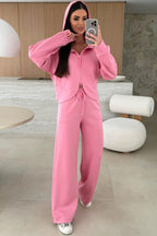Pink solid color zip-up hoodie and drawstring loose pants set by Dear-Lover, made of polyester, viscose, and elastane, casual two-piece outfit.