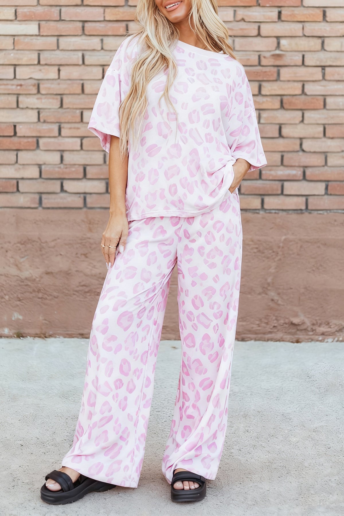 Pink leopard print two-piece top and pants set by Dear-Lover, made of polyester and elastane, casual stylish outfit.