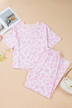 Pink leopard print two-piece top and pants set from Dear-Lover, made of polyester and elastane, stylish and comfortable.