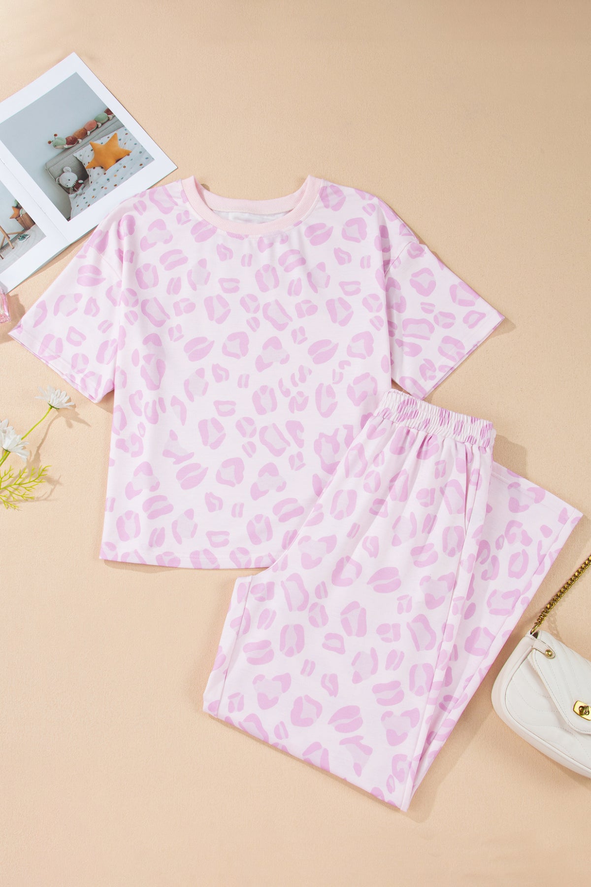 Pink leopard print two-piece top and pants set from Dear-Lover, made of polyester and elastane, stylish and comfortable.