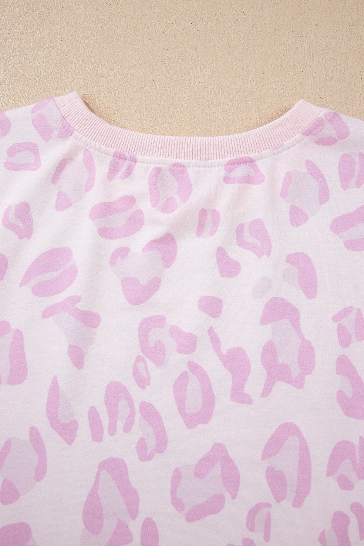 Pink leopard print two-piece top and pants set by Dear-Lover, stylish polyester and elastane pant set for women.