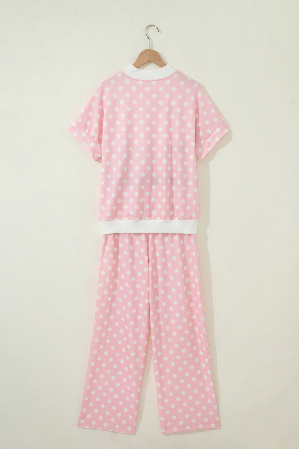 Pink polka dot print two-piece set with mock neck short sleeve top and shift pants from Dear-Lover, made of polyester and elastane.