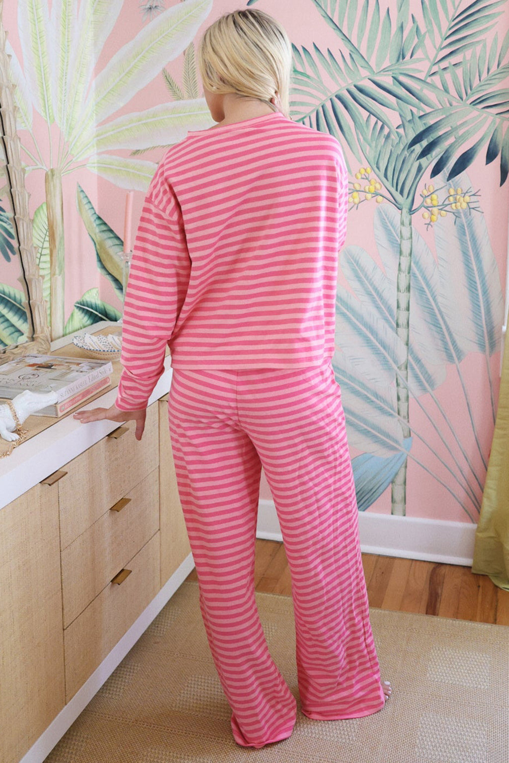 Pink stripe two-piece set with drop shoulder round neck top and buttoned straight pants by Dear-Lover, made of cotton and elastane.