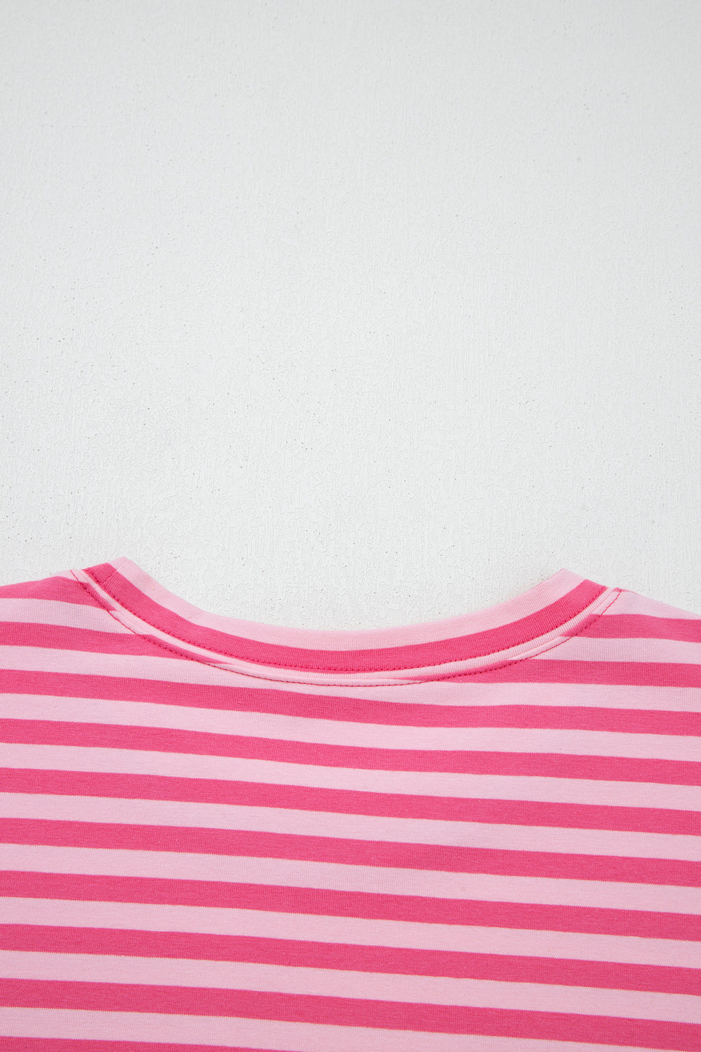 Pink stripe two-piece set with drop shoulder round neck top and buttoned straight pants, made of cotton and elastane by Dear-Lover.