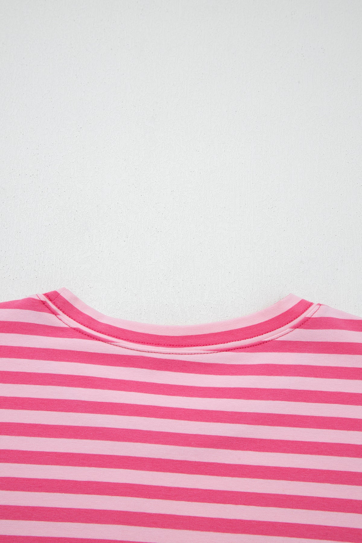 Pink stripe two-piece set with drop shoulder round neck top and buttoned straight pants, made of cotton and elastane by Dear-Lover.