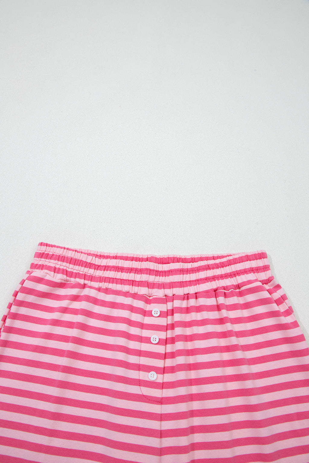 Pink stripe two-piece set with drop shoulder round neck top and buttoned straight pants from Dear-Lover, made of cotton and elastane.