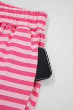 Pink stripe drop shoulder round neck top with buttoned straight pants, Dear-Lover two-piece set in cotton-elastane fabric.
