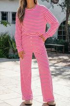 Pink stripe two-piece set with drop shoulder round neck top and buttoned straight pants by Dear-Lover, made of cotton and elastane.
