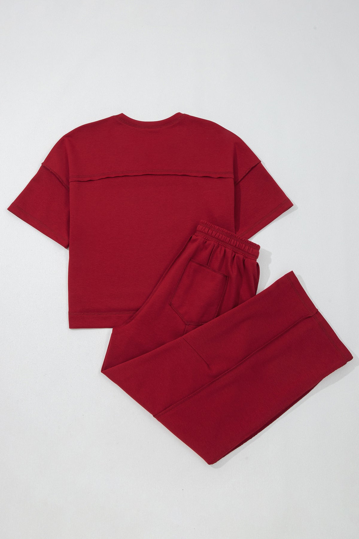 Racing red drop shoulder boxy tee and barrel pants set by Dear-Lover, featuring a stylish two-piece polyester-cotton casual outfit.