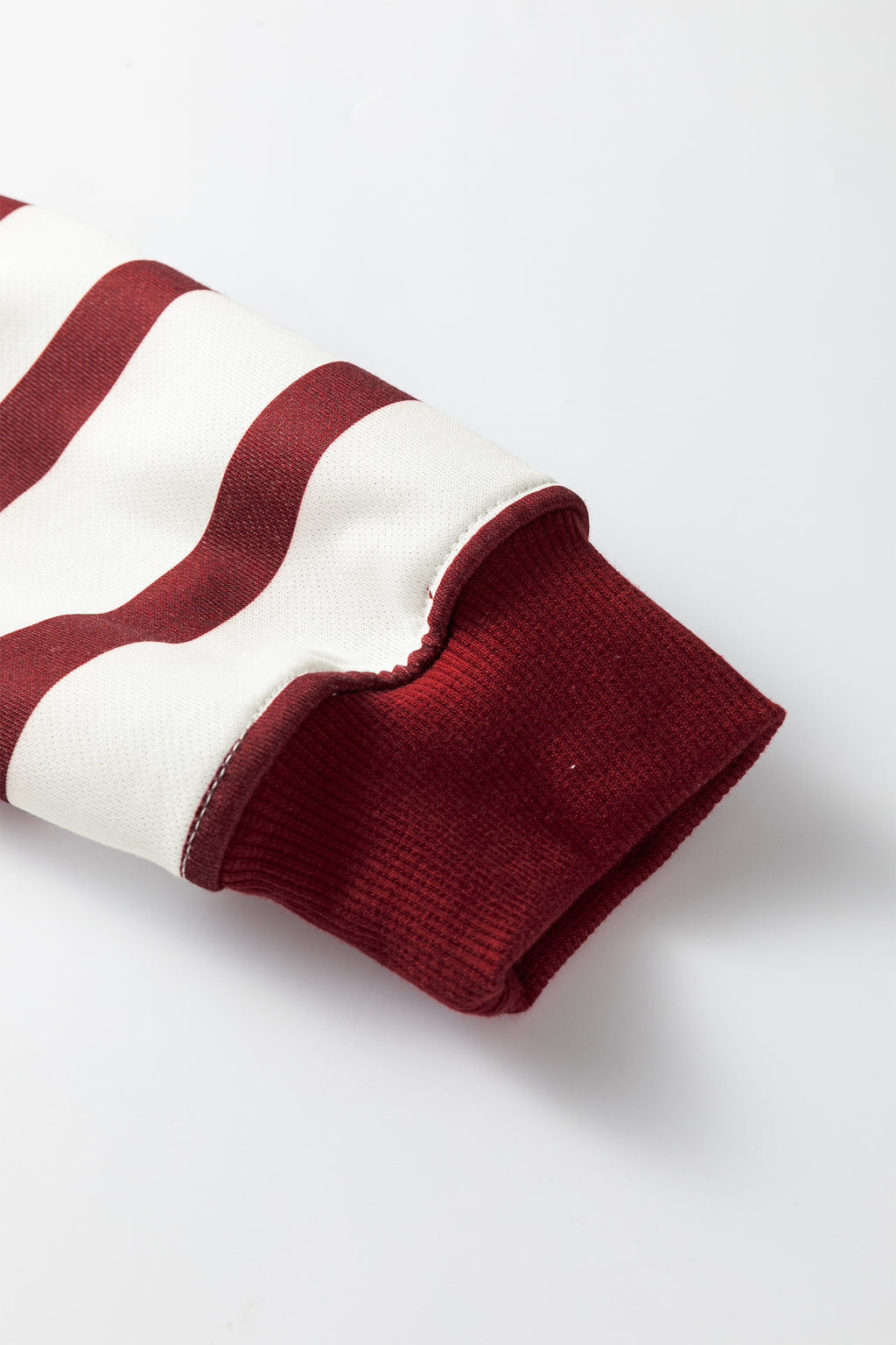 Red stripe pullover hoodie and ribbed solid pants from Dear-Lover two-piece set, casual red and white athletic outfit.
