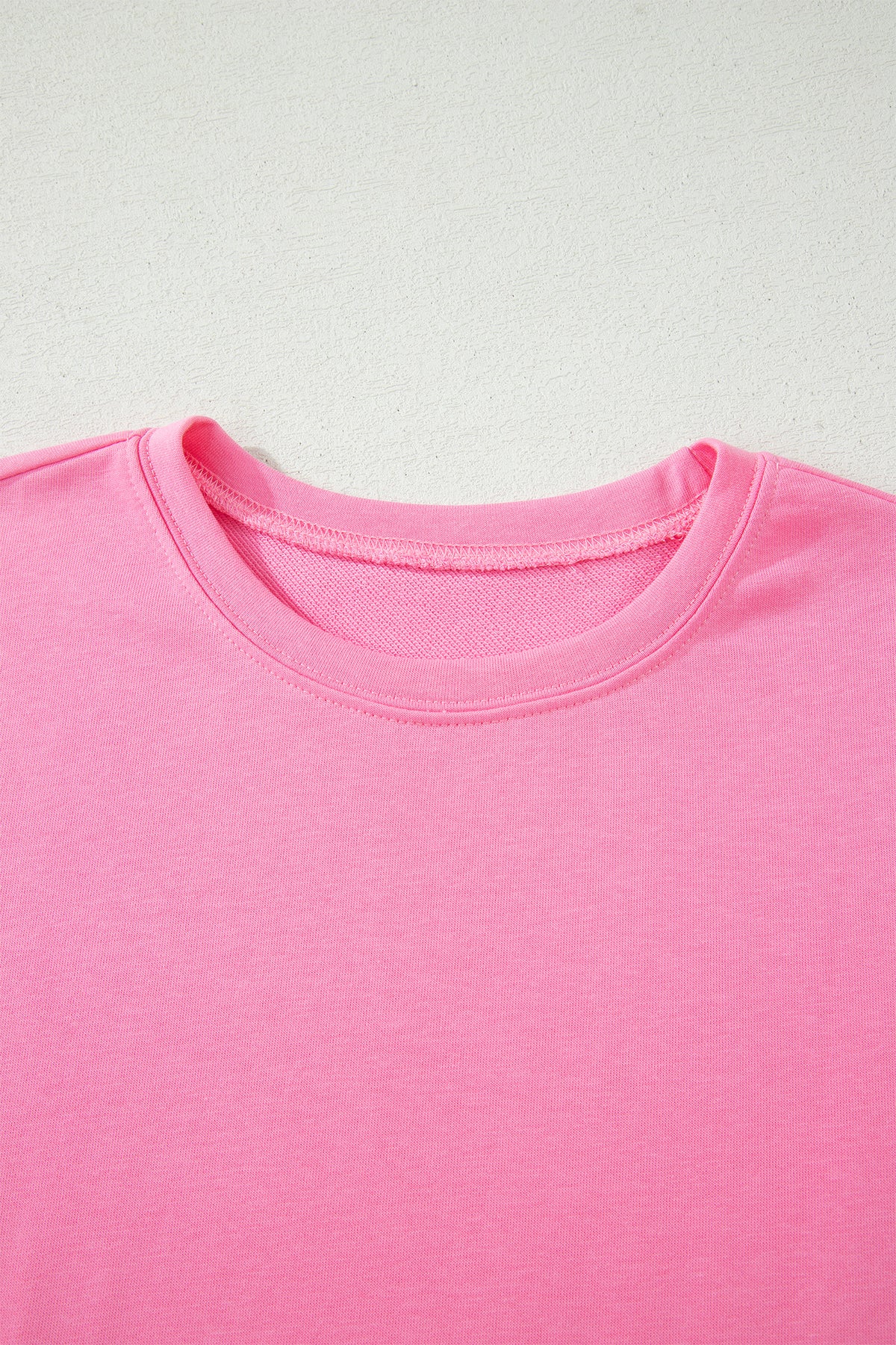 Pink solid oversized T-shirt and casual pants set by Dear-Lover, featuring pockets in a two-piece outfit for relaxed style.