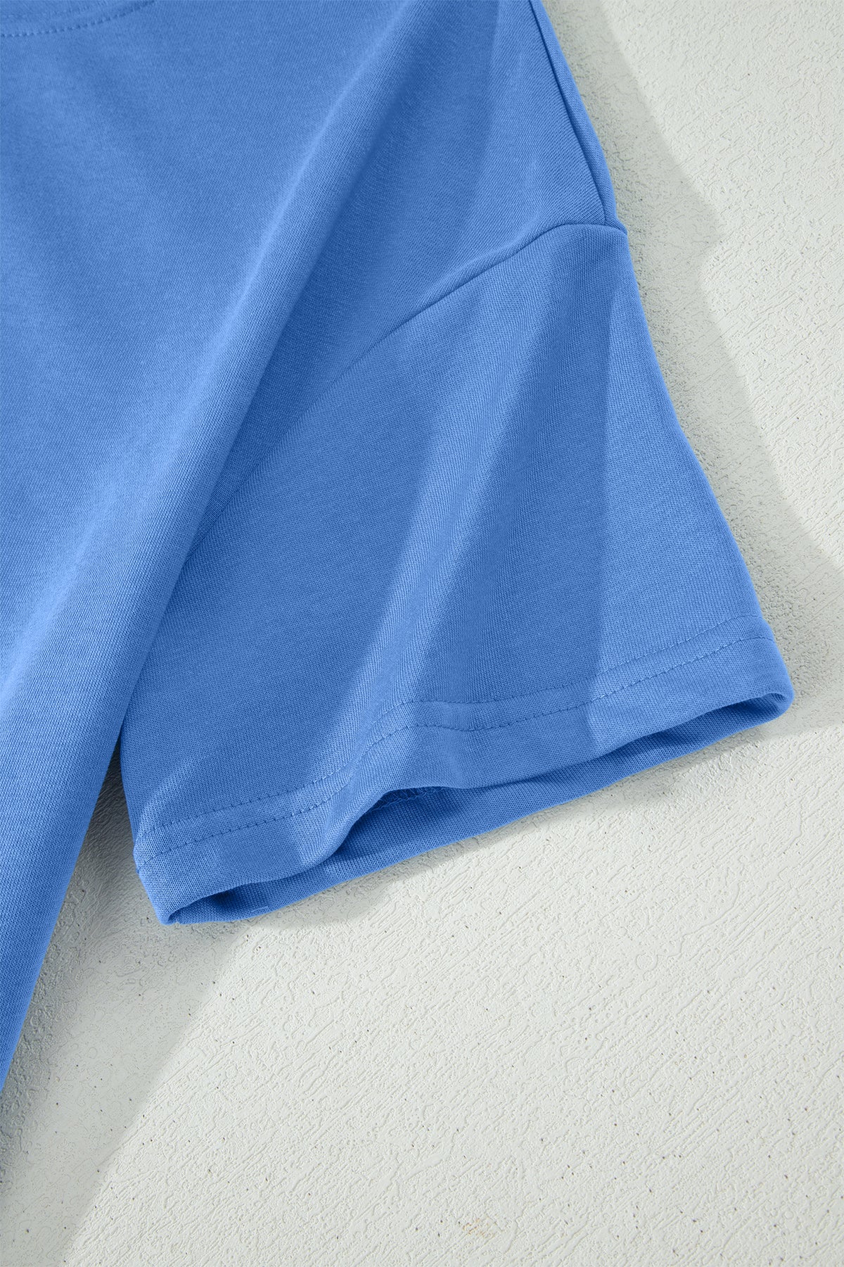 Pink solid cover oversized tee with pocket, paired with casual pants in a two-piece set by Dear-Lover Dropshipping.