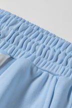 Sky blue color block patchwork polka dot wide-leg pant set by Dear-Lover, featuring two-piece polyester and cotton casual style.