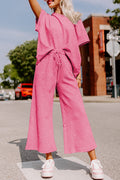 Strawberry pink textured loose fit T-shirt and drawstring pants set by Dear-Lover, casual two-piece outfit for women.