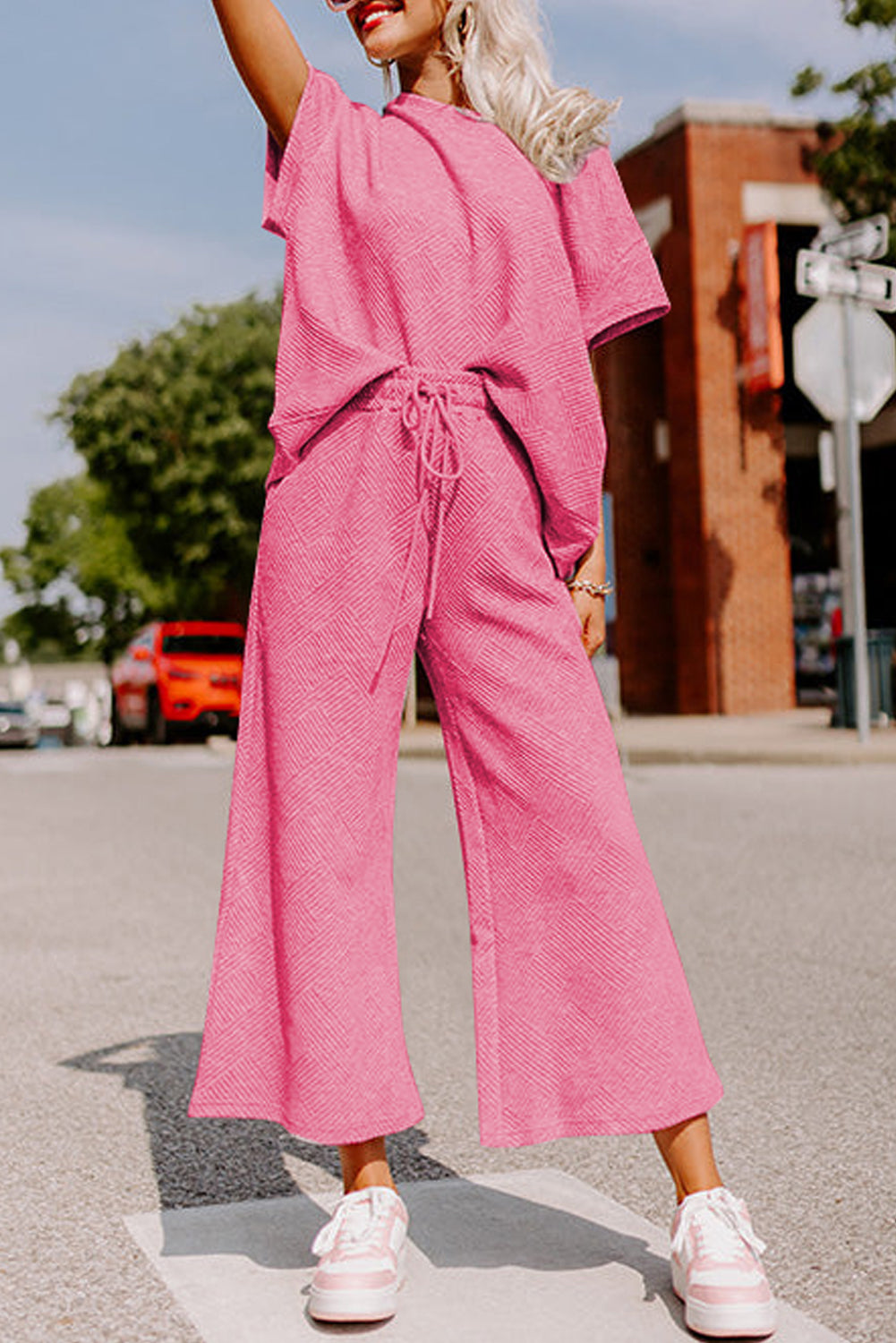 Strawberry pink textured loose fit T-shirt and drawstring pants set by Dear-Lover, casual two-piece outfit for women.