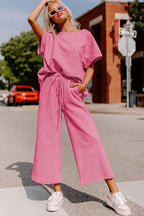 Strawberry pink textured loose fit T-shirt and drawstring pants set from Dear-Lover, casual two-piece outfit for women.