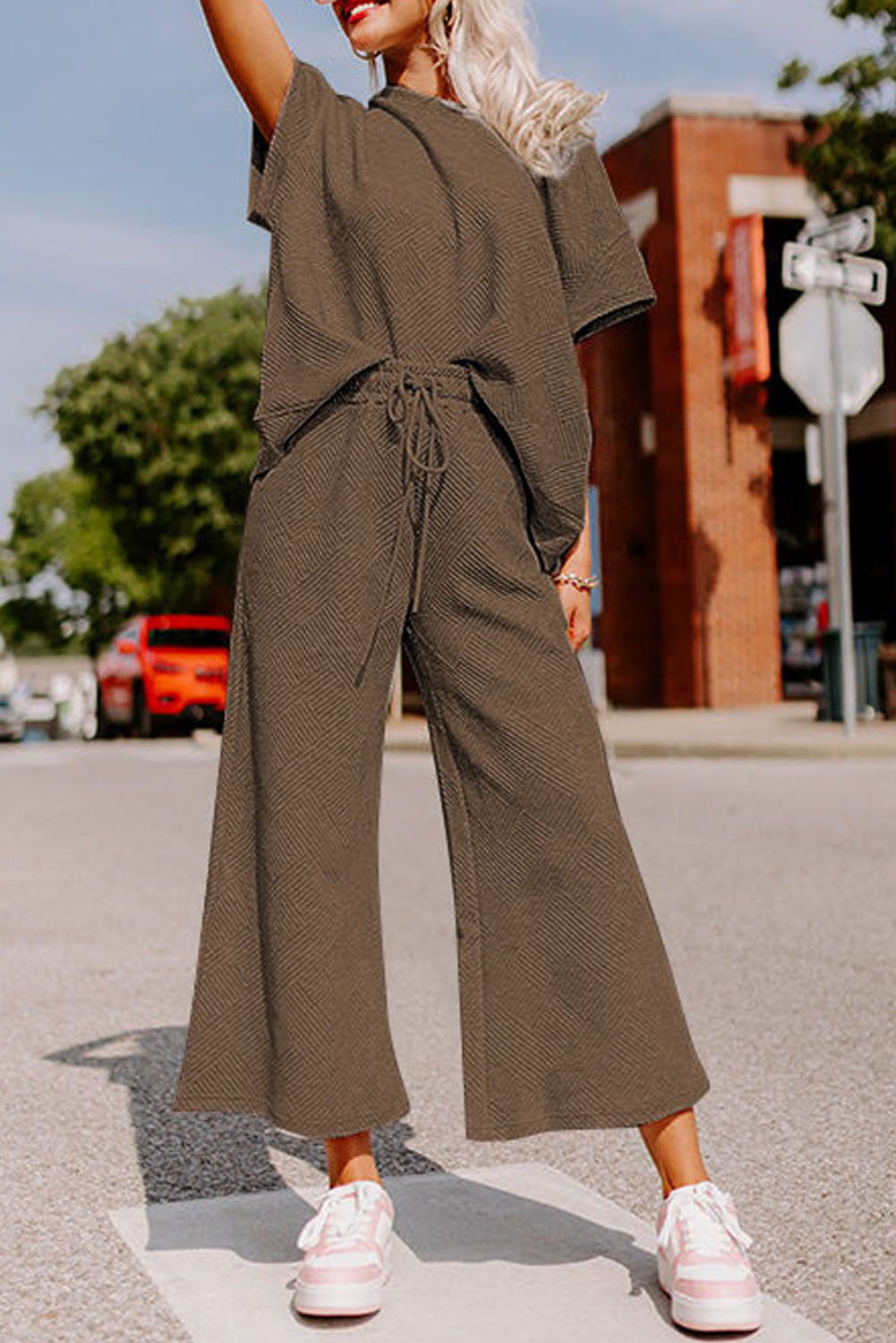Strawberry pink textured loose fit T-shirt and drawstring pants set by Dear-Lover, casual two-piece outfit for women.