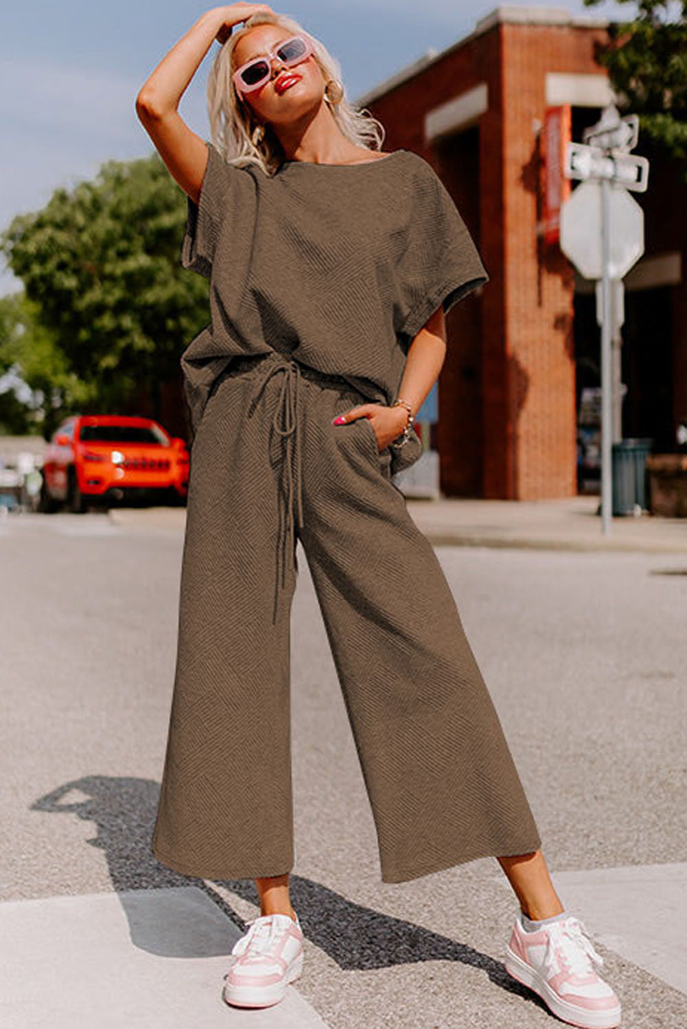 Strawberry pink textured loose-fit T-shirt and drawstring pants set by Dear-Lover, casual two-piece outfit for women.