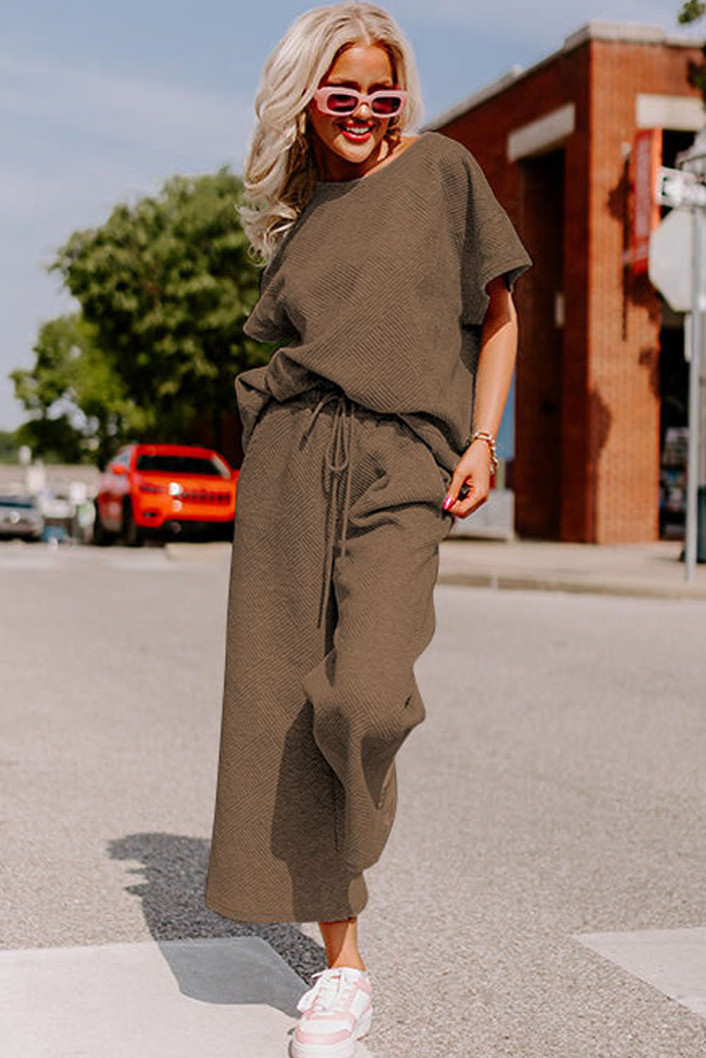 Strawberry pink textured loose fit T-shirt and drawstring pants set from Dear-Lover, perfect for casual wear.
