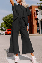 Strawberry pink textured loose fit T-shirt and drawstring pants set by Dear-Lover, casual two-piece outfit for women.