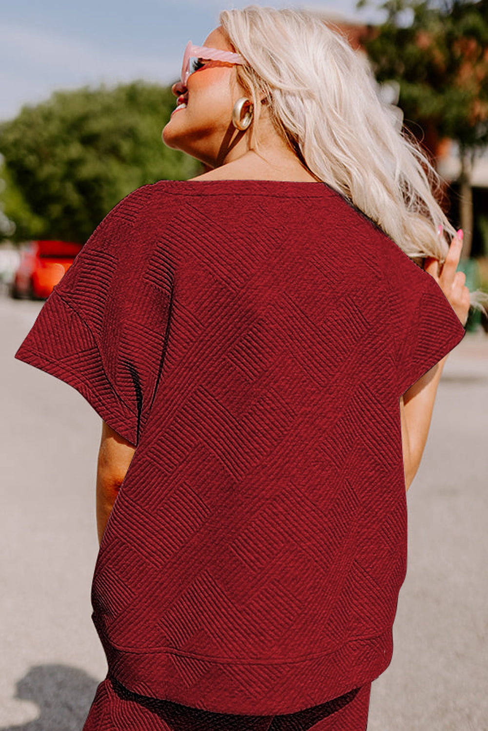Strawberry pink textured loose-fit T-shirt and drawstring pants set by Dear-Lover, casual two-piece clothing for women.