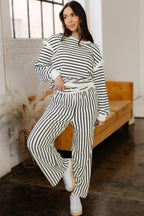White stripe ruffle trim drop shoulder top and drawstring loose pant set by Dear-Lover, made of cotton-polyester blend, two-piece outfit.
