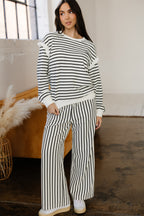 White stripe ruffle trim drop shoulder top and loose drawstring pant set by Dear-Lover, made of cotton-polyester blend.