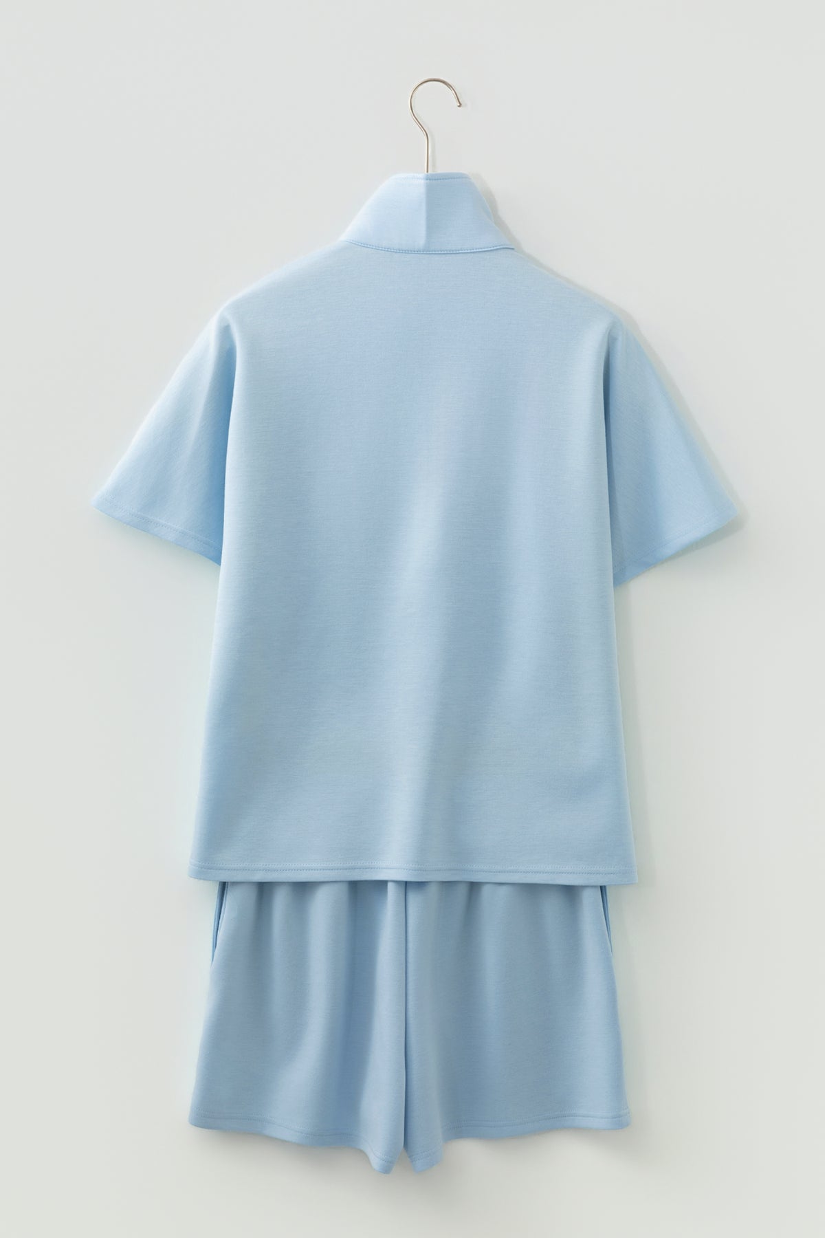 Dear-Lover blue two-piece set featuring a solid color half-zip loose short sleeve sweatshirt and matching shorts.