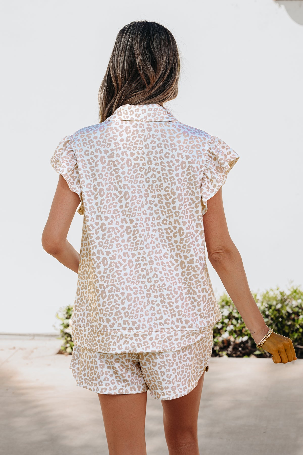 Beige leopard print zip polo top and matching shorts set for women by Dear-Lover, made of polyester and elastane.