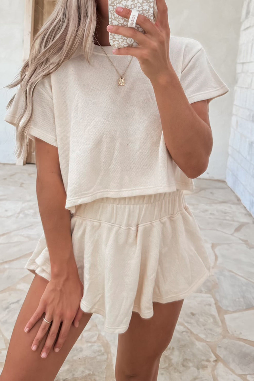 Dear-Lover Blossom 2-piece cropped tee and ruffle high waist skort set, featuring floral design and stylish summer fashion.