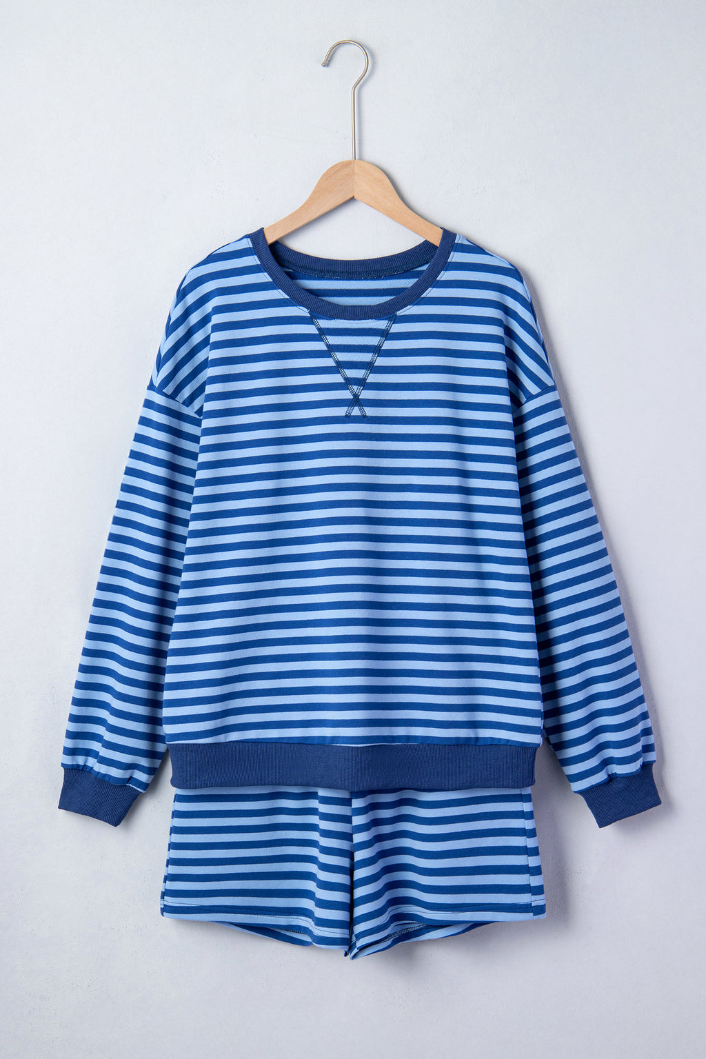 Blue stripe drop shoulder long sleeve pullover and elastic waist casual short set by Dear-Lover, made of cotton and elastane.
