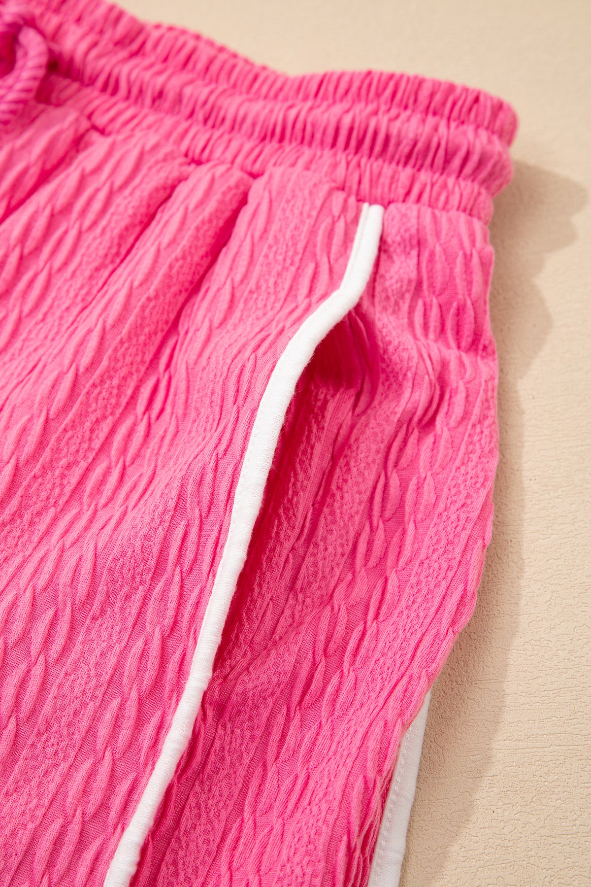 Bright pink textured color block trim loose tee and drawstring shorts set by Dear-Lover, two-piece casual summer outfit.