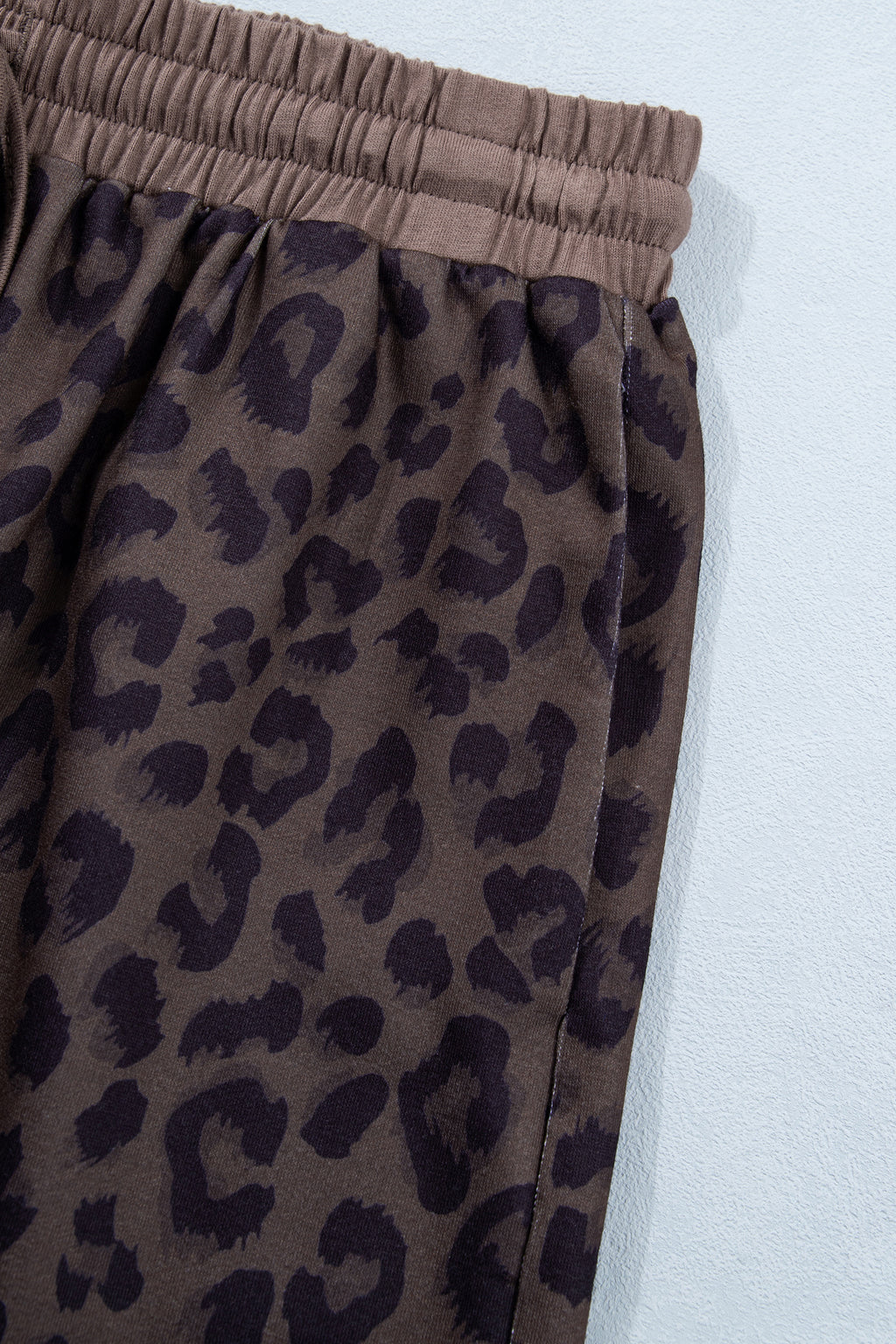 Brown V-neck collar leopard print two-piece short set from Dear-Lover, includes a top and matching shorts, made of polyester and elastane.