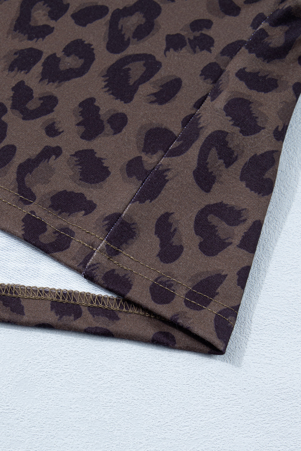 Brown leopard print two-piece short set with V-neck collar from Dear-Lover, featuring polyester and elastane fabric.