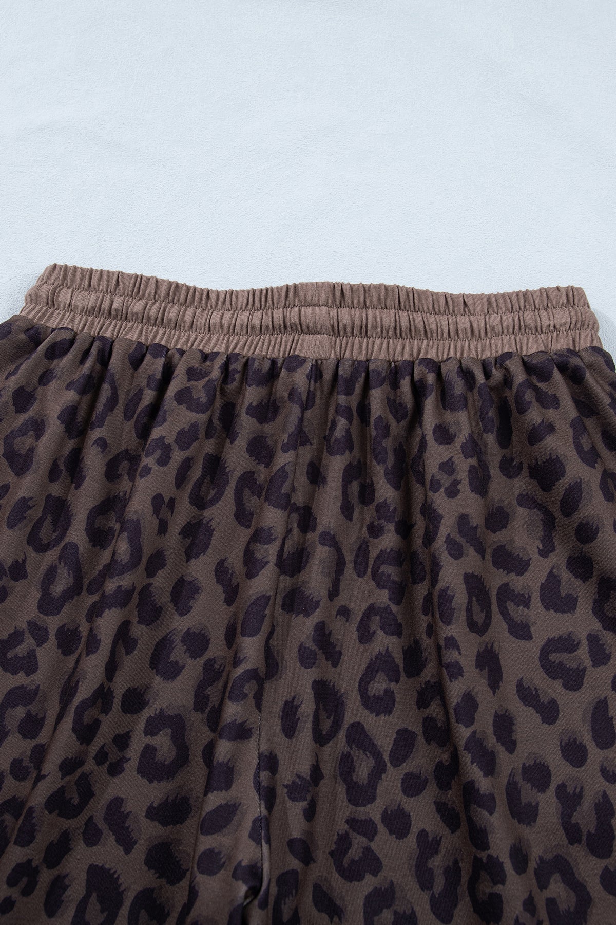 Brown V-neck collar leopard print two-piece short set by Dear-Lover, featuring a stylish top and matching shorts.
