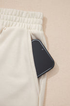 Dear-Lover polyester-cotton two-piece short set with contrast textured patchwork and raw edges, in a solid jet stream color.