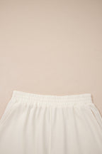 Dear-Lover Jet Stream solid color contrast textured patchwork 2-piece short set with raw edges, made of polyester and cotton.