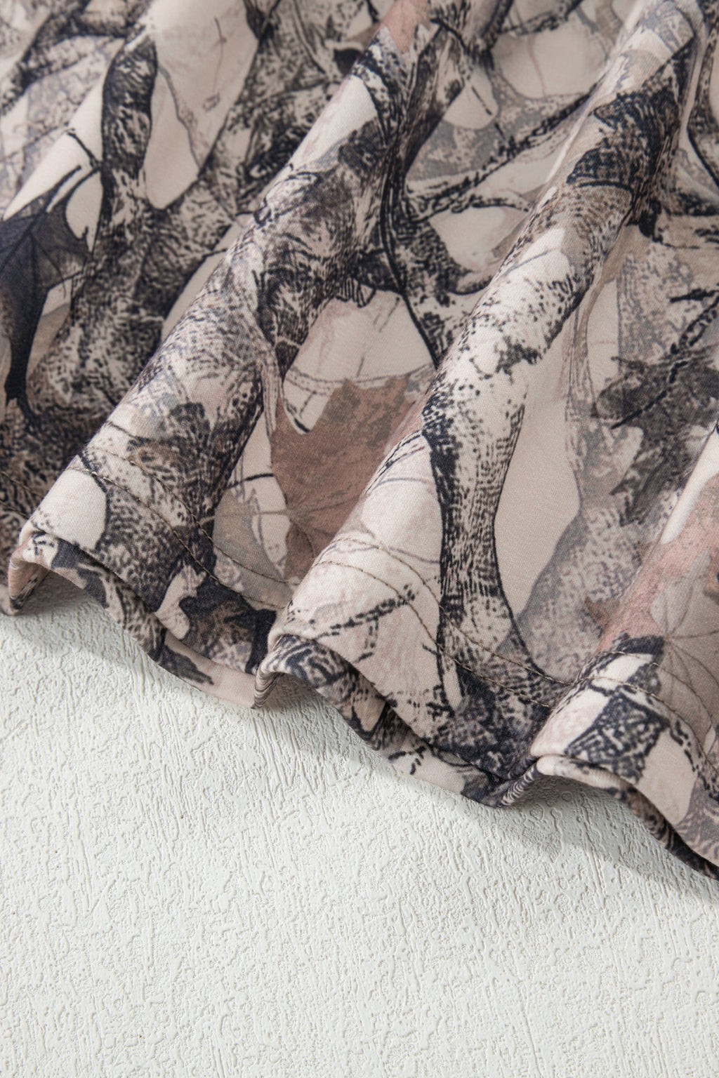 Khaki woodland camo print long sleeve top and casual short set by Dear-Lover, two-piece set made of polyester and elastane.
