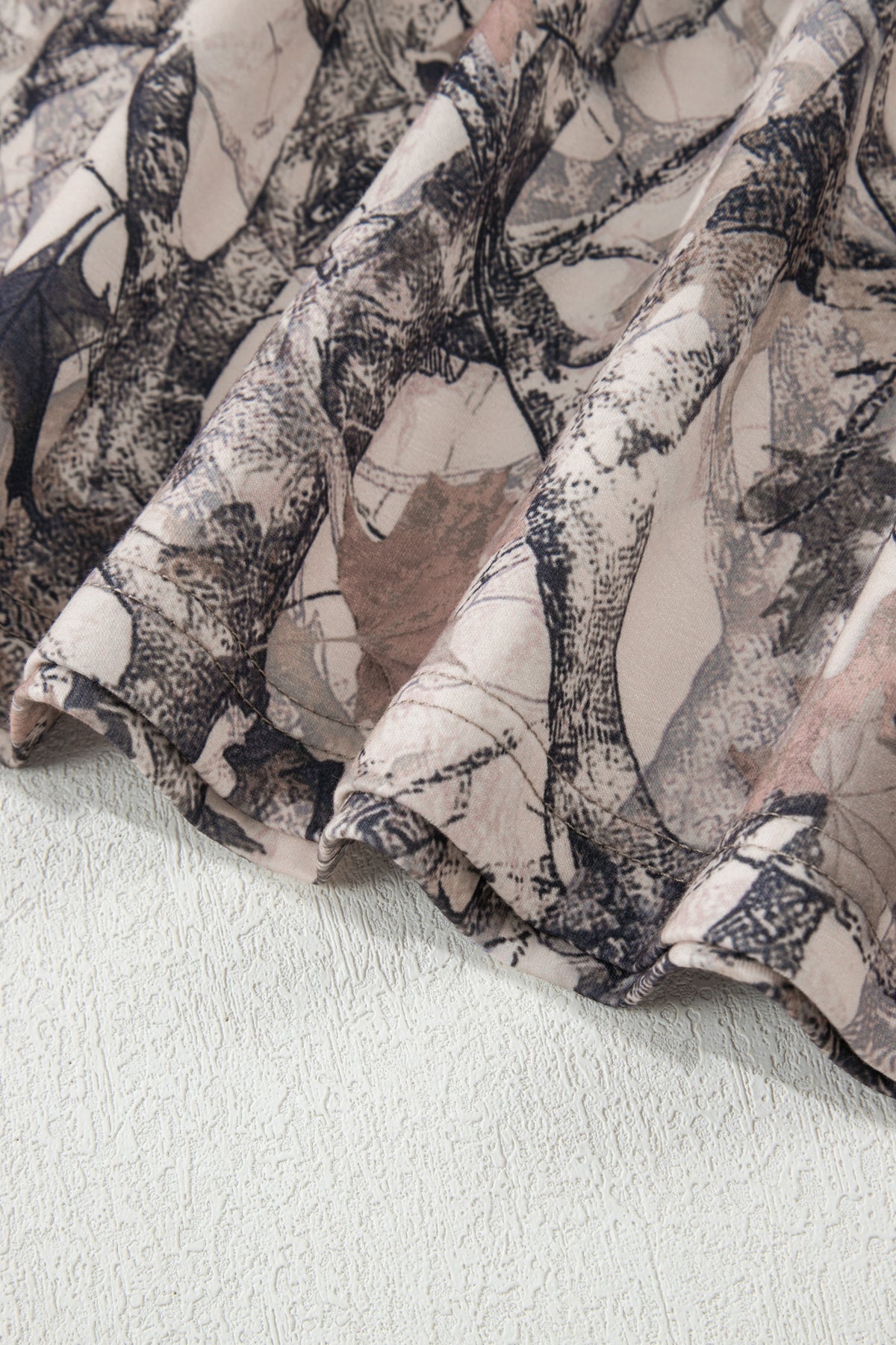 Khaki woodland camo print long sleeve top and casual short set by Dear-Lover, two-piece set made of polyester and elastane.