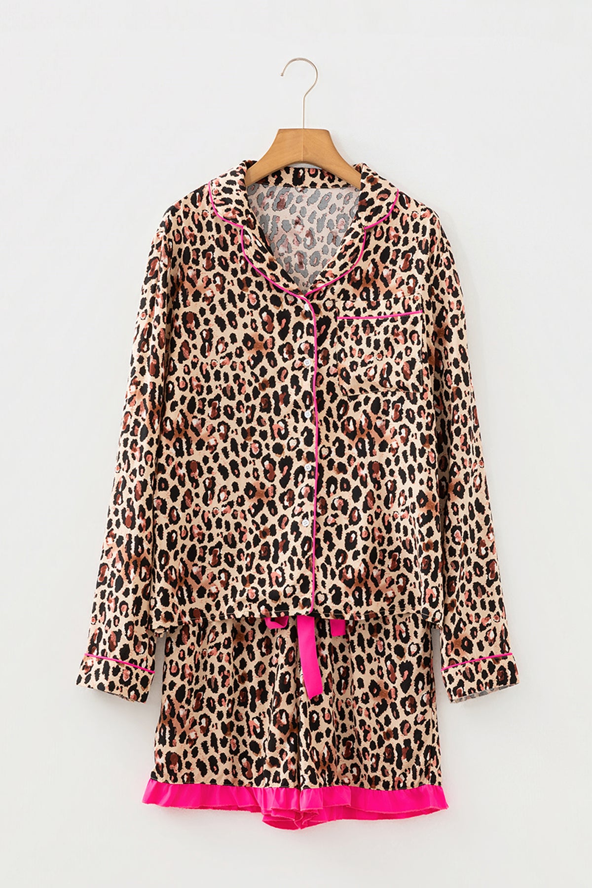 Light French beige leopard print two-piece set by Dear-Lover with contrast trim, long sleeve shirt, drawstring waist, and ruffle hem shorts.