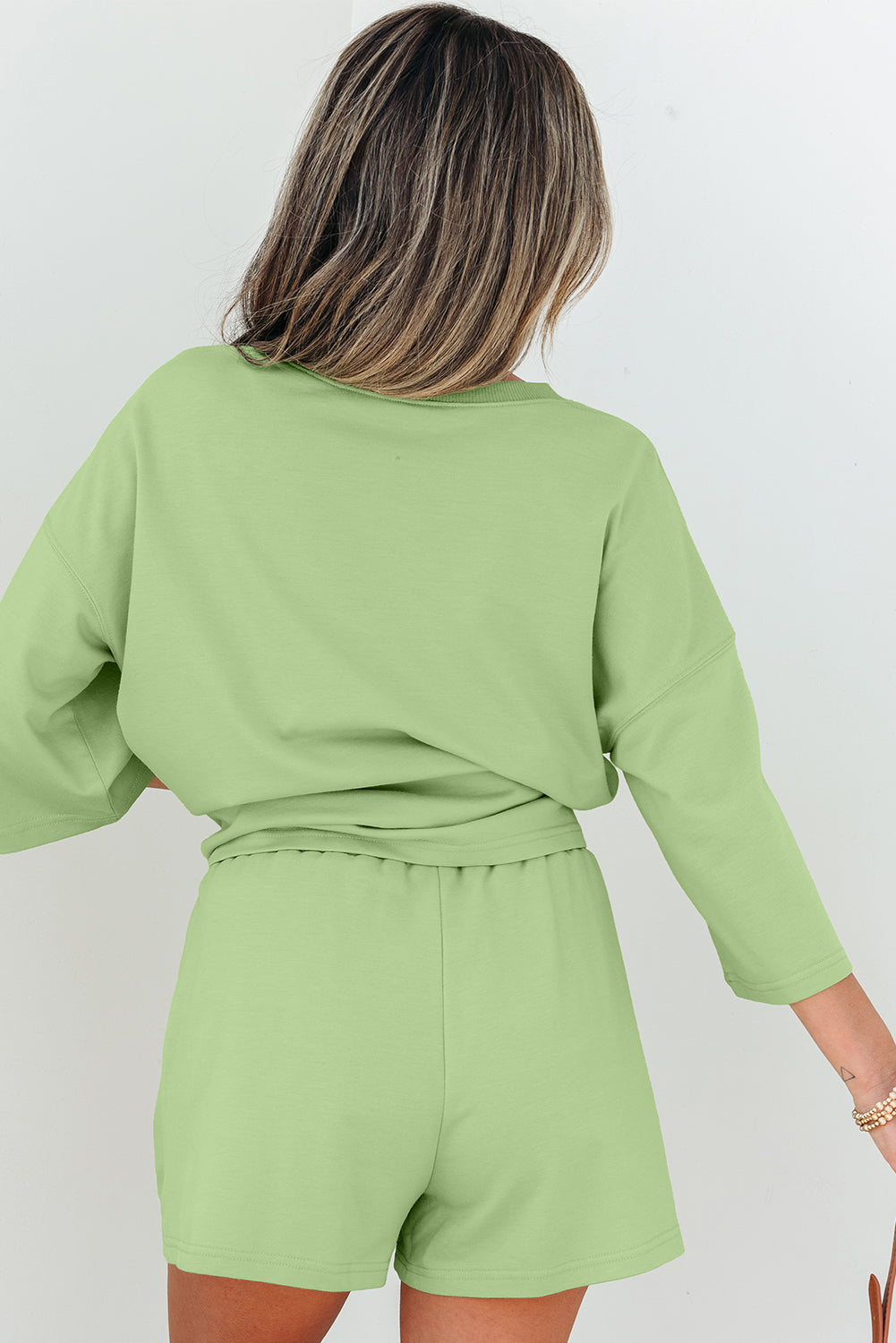 Meadow Mist Green solid two-piece set with loose V-neck half-sleeve tee and shorts, casual summer outfit by Dear-Lover Dropshipping.