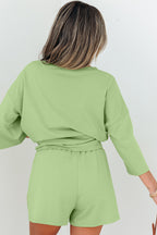 Meadow Mist Green solid two-piece set with loose V-neck half-sleeve tee and shorts, casual summer outfit by Dear-Lover Dropshipping.