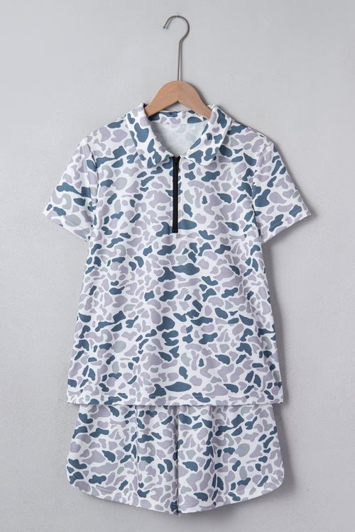 Abstract patterned polo collar T-shirt and shorts set by Dear-Lover, featuring multicolour design in polyester and elastane fabric.