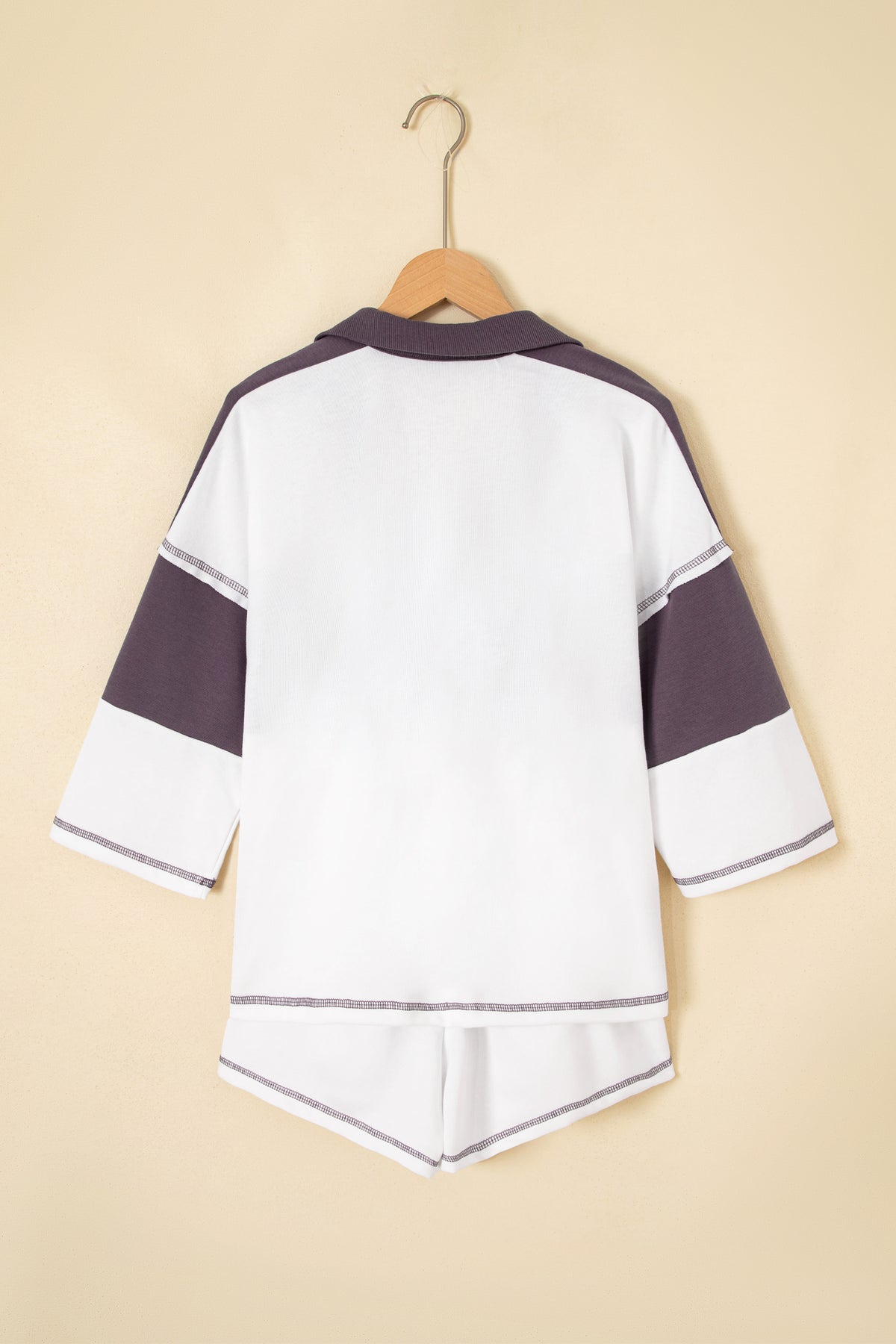 Dear-Lover two-piece set with prussian blue chicory coffee top featuring exposed seams and matching elastic waist shorts.