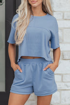 Sky blue solid color two-piece short set with textured patchwork, contrast details, and raw edges by Dear-Lover Dropshipping.