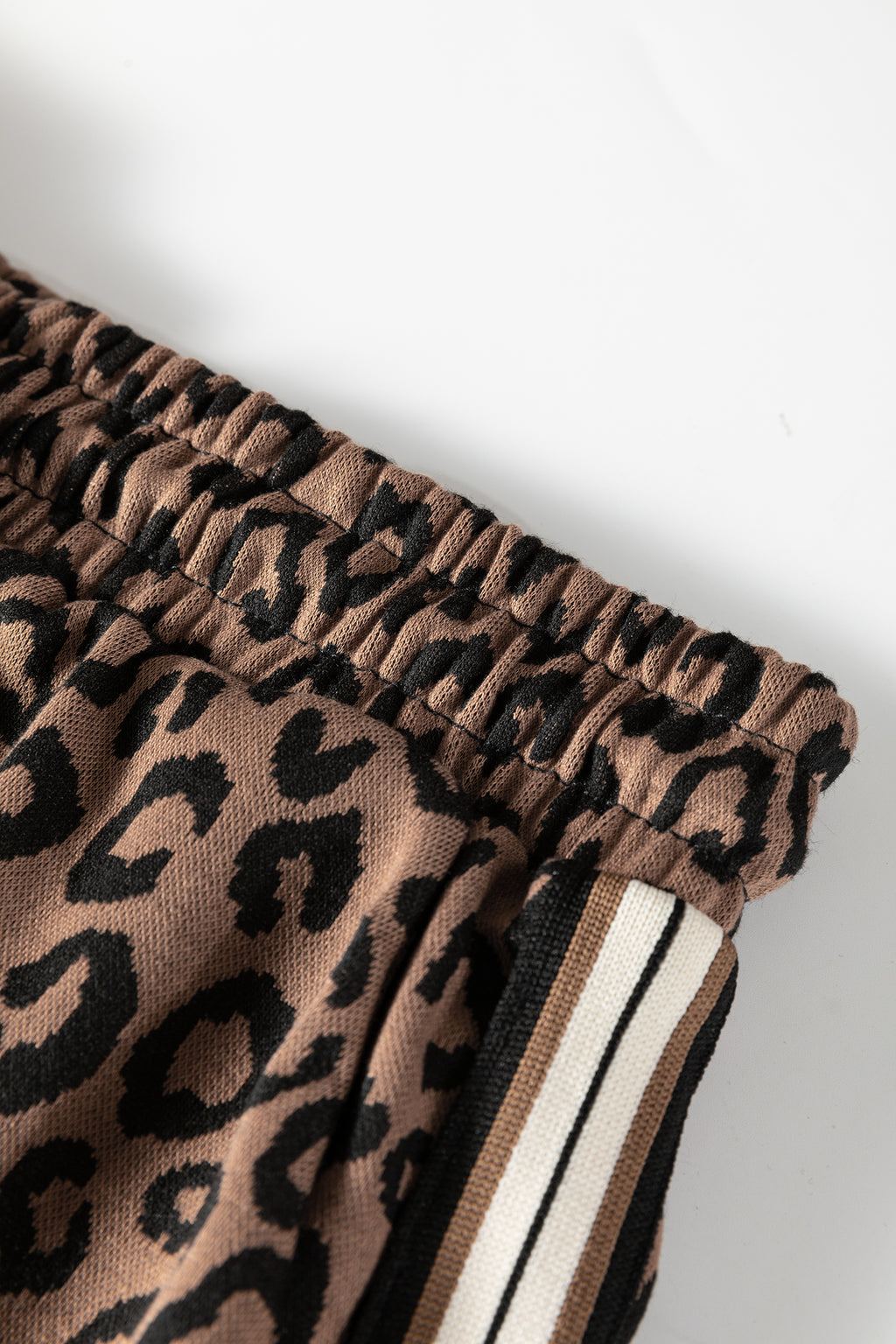 Khaki leopard print quarter zip long sleeve top and mini skirt set by Dear-Lover, made of polyester and elastane for a stylish look.