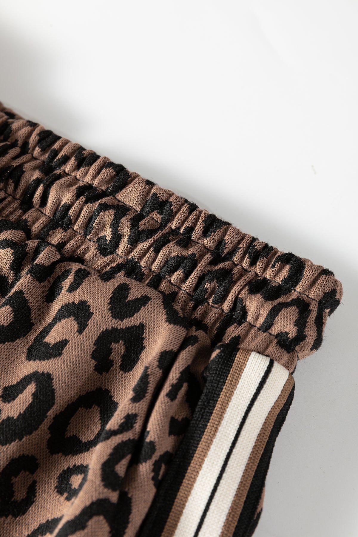 Khaki leopard print quarter zip long sleeve top and mini skirt set by Dear-Lover, made of polyester and elastane for a stylish look.