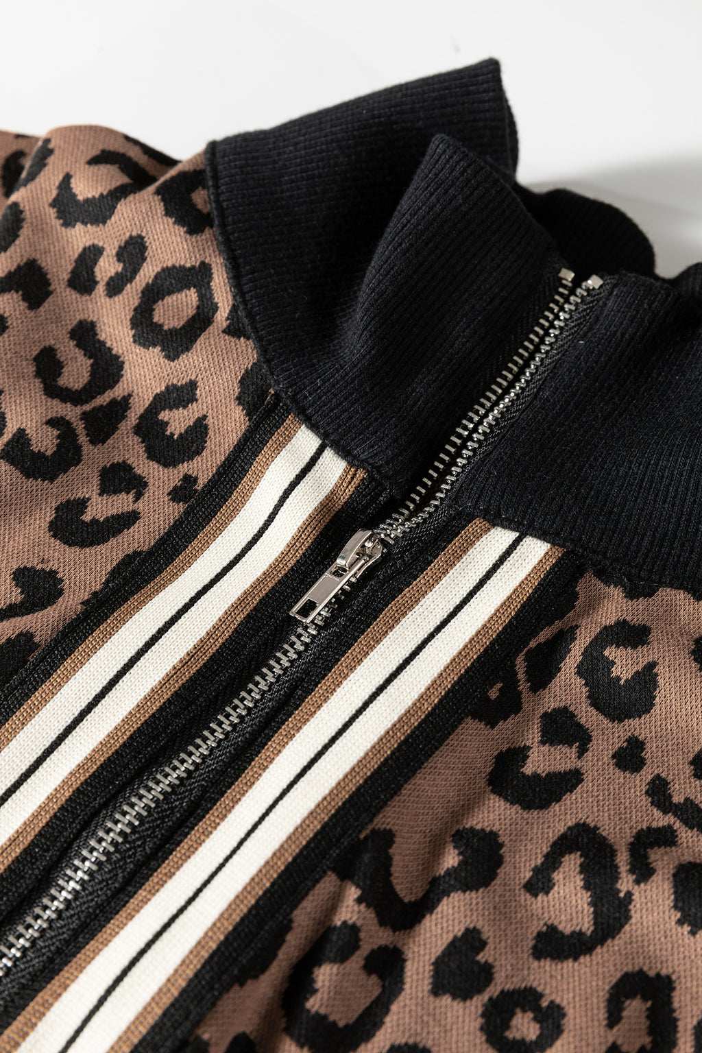 Khaki leopard print quarter zip long sleeve top and mini skirt set by Dear-Lover, casual two-piece outfit with stylish pattern.