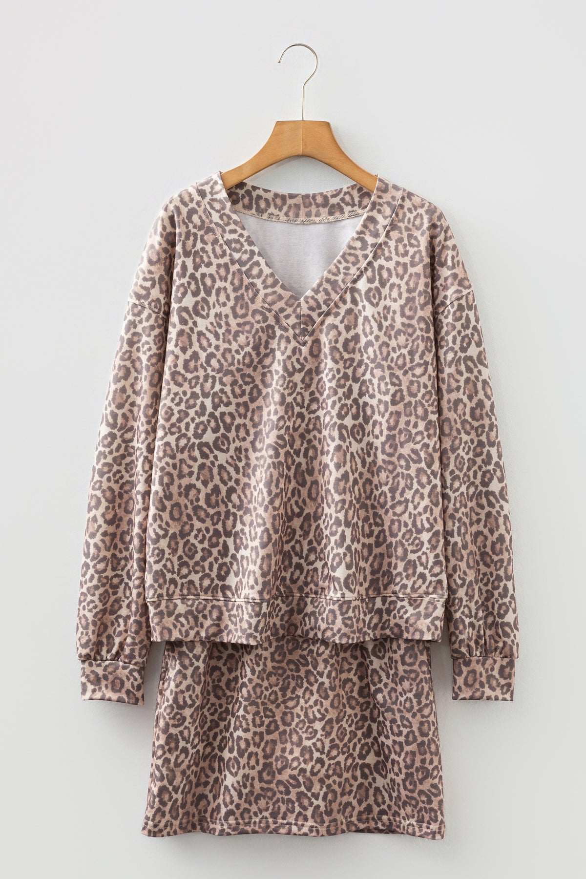 Light French beige leopard print two-piece set with V-neck pullover and mini skirt, from Dear-Lover Dropshipping.